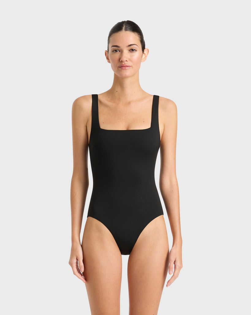 BONDI BORN Margot One Piece in Black, bandeau swimsuit with internal support and sculpting design in premium sustainable fabric.